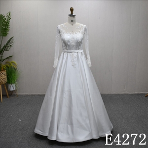 A beautiful and unique A-line long sleeves Illusion neckline lace wedding dress evening gown.