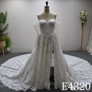 Lace and sequin design, long sleeves, sweetheart neckline, back zipper wedding dress