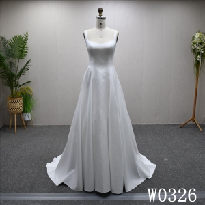 A beautiful A-line wedding evening gown with a simple pleats design