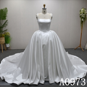 A beautiful A-line wedding evening gown with a simple pleats design with big bow