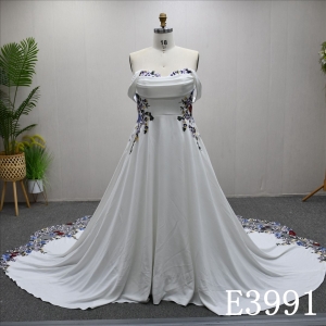 A gorgeous and unique Ivory and Colorful A-line wedding dress evening gown, adorned with lace flowers.