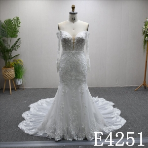 This Tulle Mermaid Long sleeves dress features Lace and Beading and Sequins design