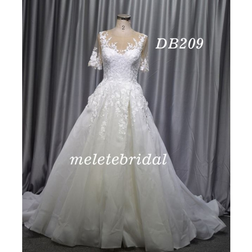 Short sleeves skin color tulle ivory organza wedding dress with a split in the front