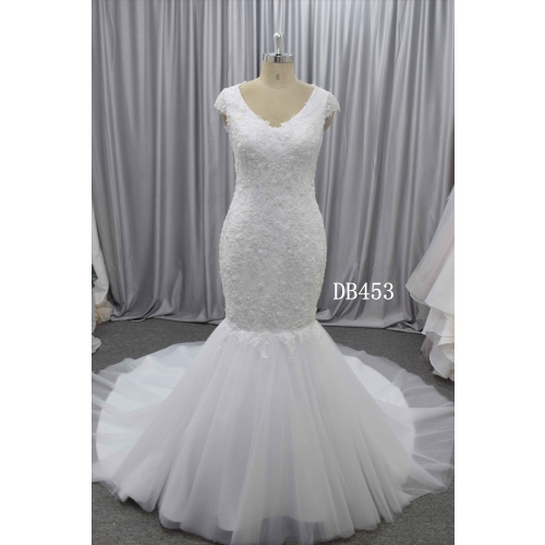 Beautiful mermaid wedding dress with delicate lace and beading