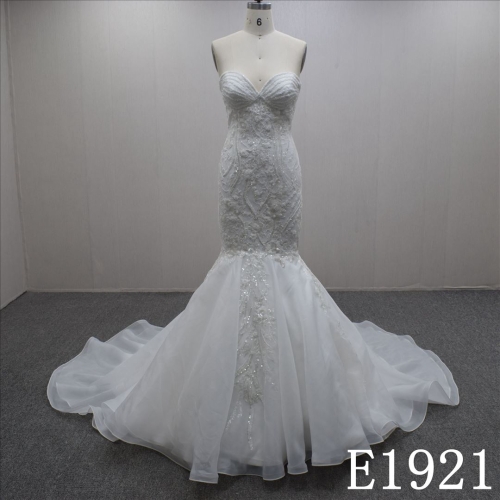 Beautiful mermaid wedding dress with delicate lace and beading