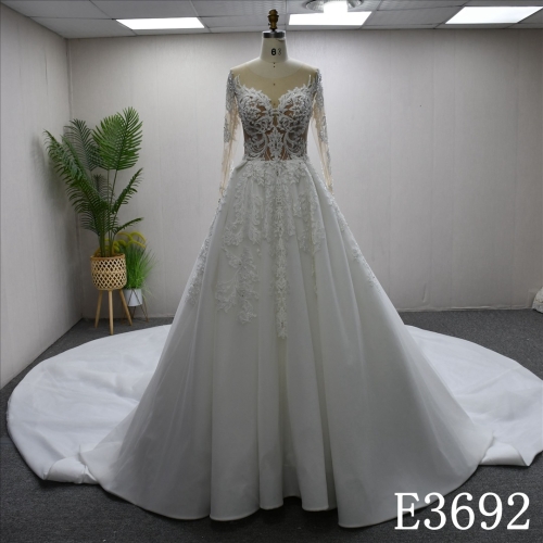 Elegant long sleeve lace beaded diamond A-line bridal gown