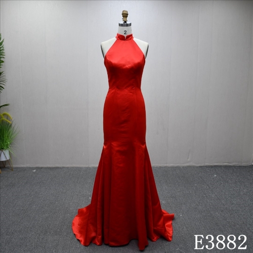 Elegant red fishtail evening dress with halter neckline and 3D flower decoration on the back
