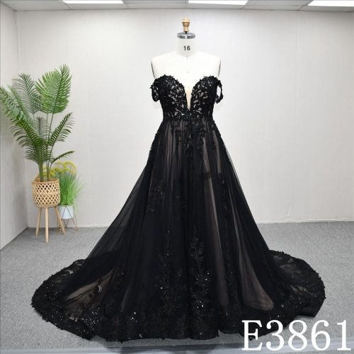 A-line black and nude wedding dress with bare sleeves and simple design