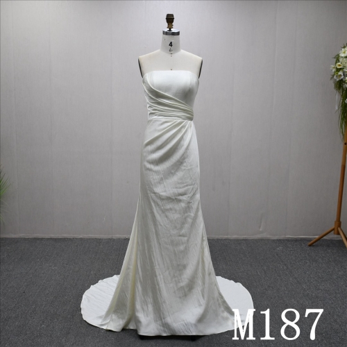 Unique and minimalist  design, spoon neckline, back zipper wedding dress