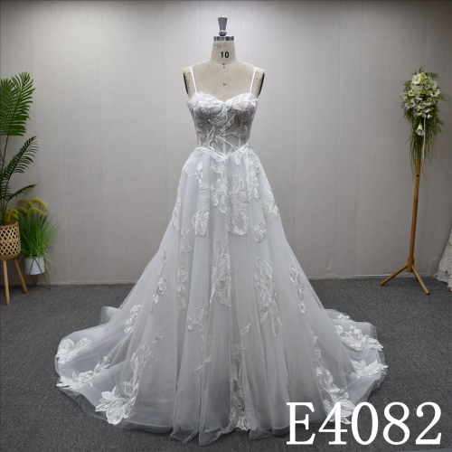 A-line wedding gown with a unique Sweetheart neckline and full-body lace embellishments