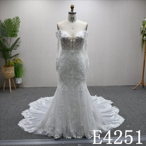 This Tulle Mermaid Long sleeves dress features Lace and Beading and Sequins design