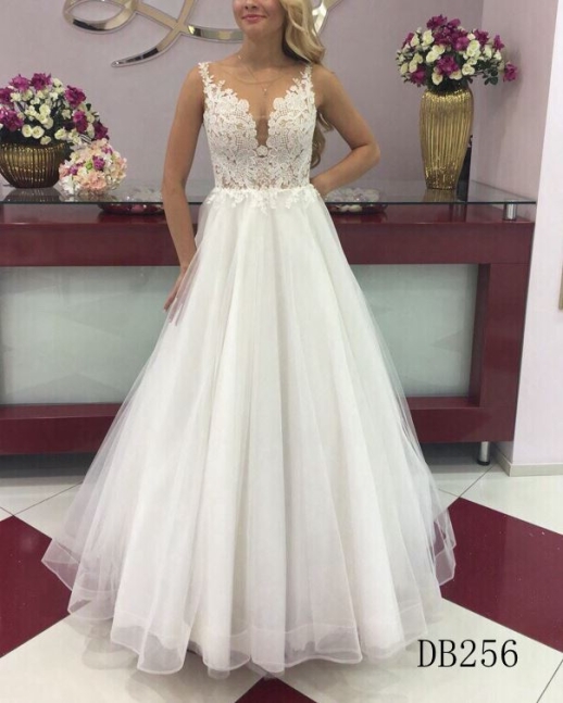 A line lace bridal dress with straps and whole sell wedding gown